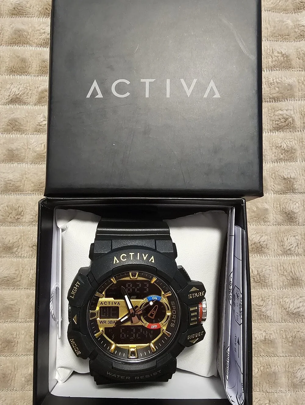 Invicta Black and Gold Sport Watch